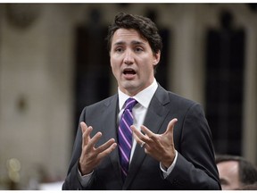 Prime Minister Justin Trudeau answers a question during Question Period in the House of Commons in Ottawa, Tuesday, Jan.31, 2017. Trudeau is abandoning his long-held promise to change the way Canadians vote in federal elections.