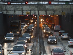 FILE PHOTO - Morning traffic flows in and out of the George Massey Tunnel in Richmond, BC, December, 14, 2016. The tunnel is set to be replaced by a bridge, which will not require a federal environmental assessment.