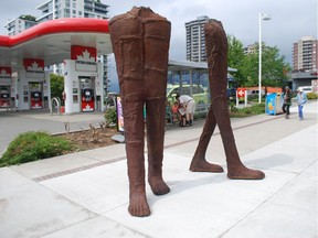 Walking Figures by Magdalena Abakanowicz will be removed this week from along Lonsdale in North Vancouver. The Vancouver Biennale sculpture is going to La Balade de la Paix/An Open-Air Museum in Montreal. Photo courtesy of Vancouver Biennale.