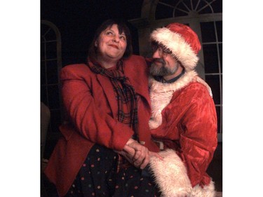 Actor Nicola Cavendish sits in ‘Santa’ Bill Millerd’s lap in 1995.