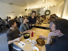 A lively lunch crowd inside the bustling Haru Korean Kitchen.