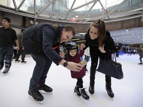 File: Matt Wright captures a special moment on his smartphone with daughter Charlotte 2, and wife Camille.