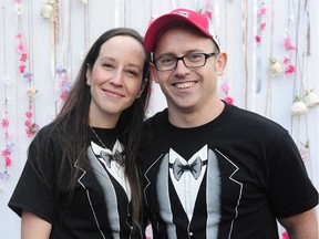 Nick Biddall and Carly Ridyard getting married at a group wedding with numerous other couples offered for free at Robson Square in Vancouver, BC., February 12, 2017.