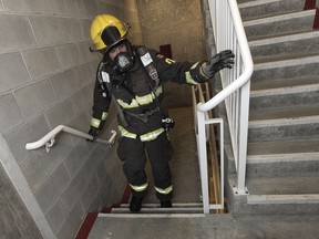 VANCOUVER, BC., February 23, 2017 -- Some of the 250 people including 100 BC firefighters climb ing 48 flights of stairs to the top of the Sheraton Wall Centre to raise awareness/funds for the BC Lung Association in Vancouver, BC., February 23, 2017. (NICK PROCAYLO/PostMedia)  00048065A ORG XMIT: 00048065A [PNG Merlin Archive]