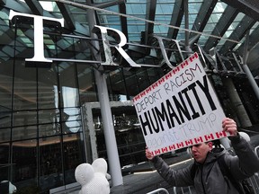 Anti Donald Trump demonstrators at the opening of the Trump International Hotel and Tower in Vancouver, BC., February 28, 2017.