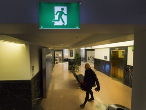 The pictogram exit sign at the Sinclair Centre in Vancouver on Tuesday. Arlen Redekop/PNG