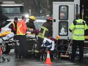 Vancouver Police and Emergency Paramedics on scene at a motor vehicle accident involving two cars and a Sunrise Seniors Living van at Oak Street and 57th Avenue, in Vancouver, February 9, 2017. Oak Street is closed between 56th Avenue and 59th Avenue and numerous seniors have been taken to hospital.