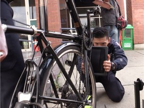 Vancouver community safety officers spent Oct. 26, 2015, outside police headquarters on Cambie Street, where a station was set up to register bikes in the 529 Garage database.