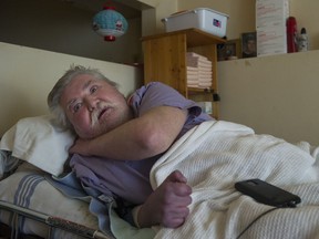 Quadriplegic Guy Williamson at home in east Vancouver on Friday. The 54-year-old Williamson got a reprieve from a B.C. Supreme Court judge regarding his eviction notice.