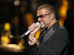 FILE - In this Sept. 9, 2012 file photo, British singer George Michael sings in concert to raise money for AIDS charity Sidaction, in Paris, France. A British coroner said Tuesday, March 7, 2017, that George Michael died of natural causes as the result of heart disease and a fatty liver. Darren Salter, senior coroner for Oxfordshire, says a post-mortem has found that the singer died of &ampquot;dilated cardiomyopathy with myocarditis and fatty liver.&ampquot; Michael died at his home in southern England, on Dec