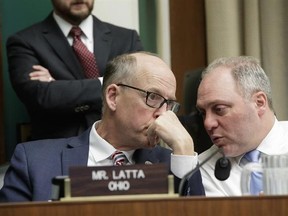 House Energy and Commerce Committee Chairman Rep. Greg Walden, R-Ore., left, confers with House Majority Whip Steve Scalise of La. on Capitol Hill in Washington, Thursday, March 9, 2017. after working through the night to argue the details of the GOP&#039;s &ampquot;Obamacare&ampquot; replacement bill. (AP Photo/J. Scott Applewhite)