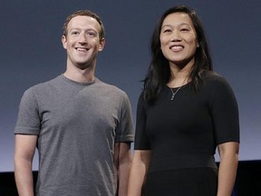 FILE - In this Sept. 20, 2016 file photo, Facebook CEO Mark Zuckerberg and his wife, Priscilla Chan, smile as they prepare for a speech in San Francisco. Zuckerberg and his wife are expecting their second child. In a Facebook post, Zuckerberg says his wife Priscilla Chan is pregnant with a girl. (AP Photo/Jeff Chiu, File)