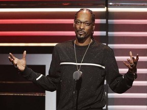 FILE - In this Sept. 17, 2016 file photo, Snoop Dogg speaks while being honored with the &ampquot;I am Hip Hop&ampquot; award at the BET Hip Hop Awards in Atlanta. Snoop Dogg&#039;s new music video, posted Monday, March 13, 2017, aims a toy gun at a clown dressed as President Donald Trump. The video is for a remixed version of the song ‚ÄúLavender,‚Äù by Canadian group BADBADNOTGOOD featuring Snoop Dogg and Kaytranada. (AP Photo/David Goldman, File)