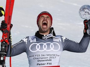 Italy&#039;s Peter Fill celebrates after a run at the men&#039;s World Cup downhill ski race Wednesday, March 15, 2017, in Aspen, Colo. (AP Photo/Brennan Linsley)