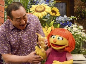 This image released by Sesame Workshop shows Julia, a new autistic muppet character debuting on the 47th Season of &ampquot;Sesame Street,&ampquot; on April 10, 2017, on both PBS and HBO. (Zach Hyman/Sesame Workshop via AP)