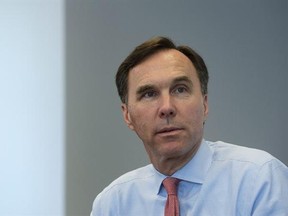 Finance Minister Bill Morneau takes part in a interview with The Canadian Press at his office in Ottawa, Thursday, March 23, 2017. THE CANADIAN PRESS/Adrian Wyld