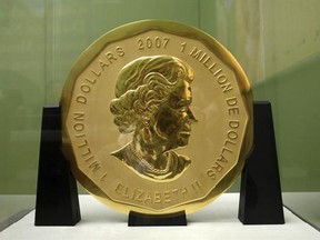 FILE - The Dec. 12, 2010 file photo shows the gold coin &#039;Big Maple Leaf&#039; in the Bode Museum in Berlin. The 100-kilogram (220 pound) gold coin disappeared from the museum. (Marcel Mettelsiefen/dpa via AP)