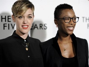 FILE - In this Feb. 11, 2015, file photo, Lauren Morelli, left, and Samira Wiley arrive at the LA Premiere of &ampquot;The Last Five Years&ampquot; in Los Angeles. Wiley, who plays the character Poussey Washington on the Netflix show &ampquot;Orange is The New Black,&ampquot; and Lauren Morelli wedded Saturday, March 25, 2017, in Palm Springs, Calif. Morelli has worked as a writer, story editor and producer of the show, which depicts life inside a women&#039;s prison, since 2014. (Photo by Richard Shotwell/Invision/AP, File)