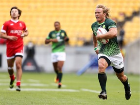 Werner Kok of South Africa breaks away for a try in the Cup semifinal match between Canada and South Africa during the 2017 Wellington Sevens at Westpac Stadium on Jan. 29, 2017, in New Zealand.