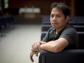 An El Salvadoran asylum seeker who was granted permanent residency after spending two years in sanctuary in a British Columbia church to avoid deportation has again lost a fight to clear his name. Figueroa, a refugee from El Salvador, is pictured in the Walnut Grove Lutheran Church in Langley, Friday, Oct.4, 2013.