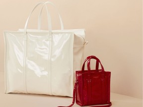 BALENCIAGA XL Bazar shopper in blanc, $3785 and XS Bazar shopper in rouge cardinal, $1815. Both in patent leather. Available at Holt Renfrew.