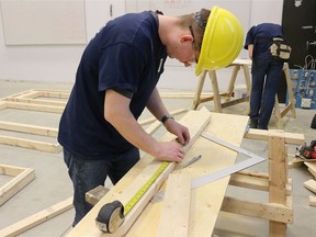 New legislation requires licensed carpenters to either pay dues to become a member in good standing of the Residential Builders Association or pay a fee to write a multiple-choice exam.