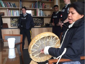 Burnaby RCMP stand by as protesters occupy Mayor Derek Corrigan's office. They are concerned about demovictions in the Metrotown area.