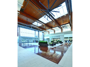 Commercial Wood Design Tsawwassen Mills, owned by Ivanhoe Cambridge and designed by Stantec Architecture, utilizes natural wood accompanied by an abundance of natural light to create a feeling of warmth and comfort for its patrons.