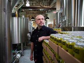 Main Street Brewing co-owner Nigel Pike poses for a photograph at the brewery in Vancouver, B.C., on Monday March 20, 2017. When Pike founded Main Street Brewing three years ago, his primary goal was to create an intimate, small-scale craft beer business nestled in one of Vancouver's few surviving industrial heritage buildings, with eventual plans to build a full-scale brewery on the city's outskirts. But Pike says he's now closer to his long-term vision than he thought he would be thanks to innovative companies resolving some of the logistical nightmares facing fledgling breweries that want to package and distribute products beyond their brick-and-mortar walls.