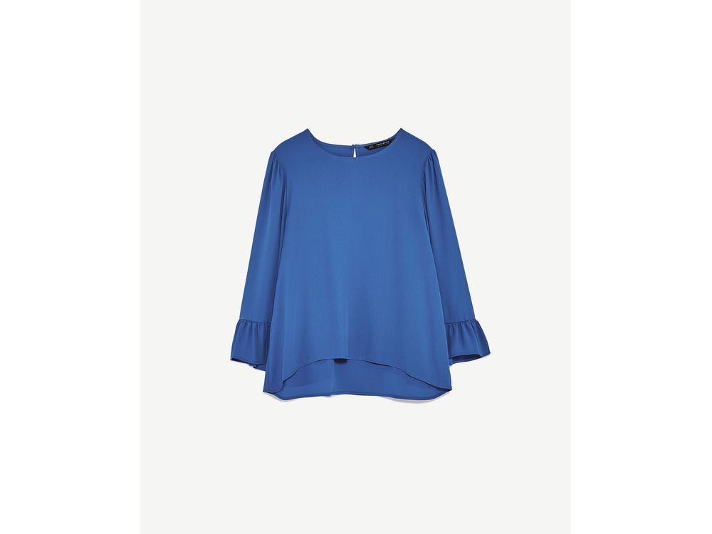 Embrace one of the season's biggest trends -- statement sleeves -- with open arms in this blue top from Zara, $45.90. 