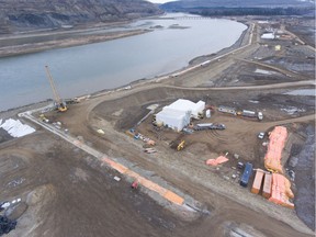 Aerial view of work on one of the cofferdams that will hold back water while permanent Site C facilities are built.