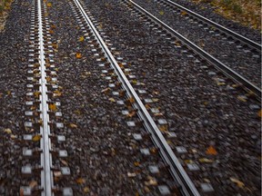 File photo: Two people escaped injury Saturday night after a train slammed into their car in Kamloops.