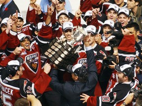 Vancouver Giants head coach Don Hay hoists the cup as his team celebrate their 3-1 win over the Medicine Hat Tigers winning the the 2007 Memorial Cup final at the PNE Coliseum on Sunday afternoon.