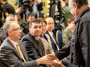 John Rustad, B.C. minister of aboriginal relations and reconciliation, greets an attendee at a 2014 revenue-sharing deal signing for development of LNG export facilities at Grassy Point near Prince Rupert, with the Lax Kw'alaams and Metlakatla First Nations.