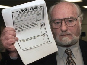 John Shields in 1997 delivering a 'report card' on the B.C. Ministry of Children and Families -- a strong of F's.
