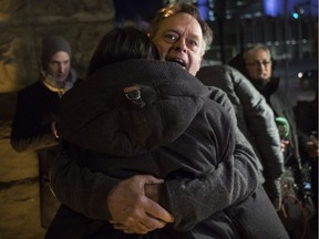 Marc Emery hugs his wife, Jodie, outside a Toronto court after being released on bail on Friday, March 10, 2017. Marc Emery faces 15 charges, including conspiracy to commit an indictable offence, trafficking and possession of proceeds of crime, while Jodie Emery faces five similar counts.