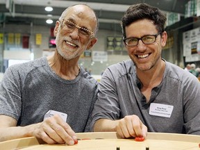 Greg Pinel of New York, right, and his dad, John Pinel.