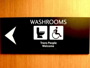 New washroom signage at Vancouver City Hall is being updated to state, "Trans* people welcome."   Trans* (with an asterisk) is an inclusive umbrella term used to refer to communities and individuals with gender identities and/or expression not matching gender binary stereotypes.