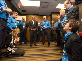 Controversial U.S. evangelist Franklin Graham (centre, in black) prays with his team before Festival of Hope crusade in Vancouver in March. Organizers claim 1,929 people physically present at the event made “commitments” to follow Jesus Christ. (Photo: BGEA)