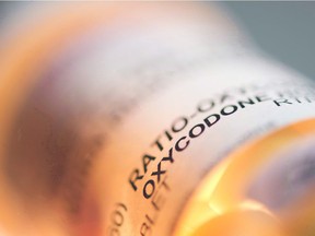 A prescription pill bottle containing oxycodone and acetaminophen is shown in 2012. Young children whose mothers have been prescribed an opioid are at an increased risk of being hospitalized for an overdose from the potent pain medications, most often through accidental ingestion, a study has found.