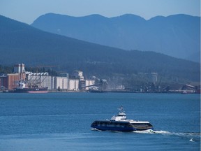 FILE PHOTO A SeaBus passenger ferry crosses Burrard Inlet to North Vancouver after leaving Waterfront Station in Vancouver, B.C., on Thursday July 2, 2015.