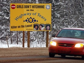 Billboard warning girls not to hitchhike on the Highway of Tears (Highway 16) where many young women have gone missing.  This is just north of Smithers.