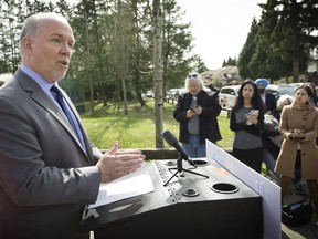 B.C. NDP leader John Horgan speaks in Surrey on Monday about his party's plan to tackle gang violence in the city. The provincial election is May 9.