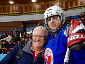 Dan (left) and Scott Howe at the first Pyongyang Ice Hockey League event in March, 2016.