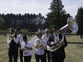 The Homegoing Brass Band, which plays funerals and other sombre occasions, was established eight years ago so founder Dr. Marc Lindy, far right, would one day have a brass band play at his funeral.