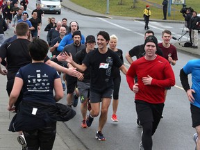 Prime Minister Justin Trudeau enjoys a morning run with members of the Canadian Forces at CFB Esquimalt in Esquimalt, B.C., on Thursday, March 2, 2017.