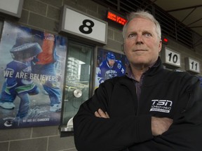 Sports-marketing expert Tom Mayenknecht stands outside Rogers Arena in Vancouver on Tuesday. The Canucks are in the difficult position of the business cycle for an NHL franchise, he said.