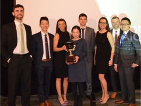 The winning UBC team poses with the NAOIP Bob Filley Cup after winning the 2017 Pacific Northwest Real Estate Challenge.