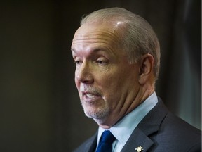 FILE PHOTO - B.C. NDP Leader John Horgan at Coast Plaza Hotel in Vancouver, B.C. February 25, 2017.