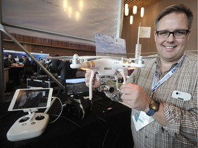 Dr. John Church of Thompson Rivers University with his cattle-tracking drone at the #BCTECH Summit in Vancouver on Jan. 18, 2016.